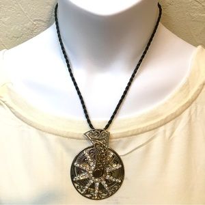 Silver tone cowboy spur necklace